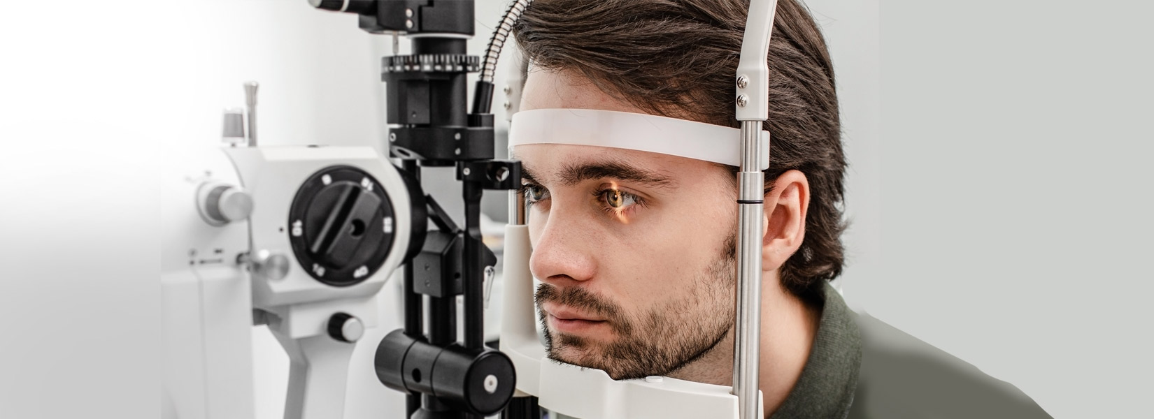 young man during eye exam in East
